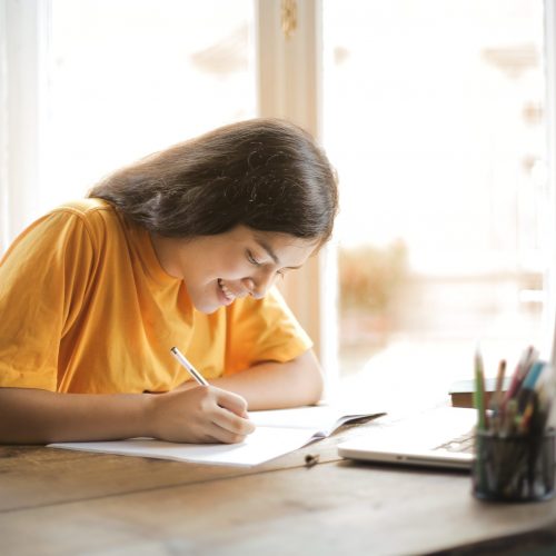 woman-in-yellow-shirt-writing-on-white-paper-3807755 woman-in-yellow-shirt-writing-on-white-paper-3807755